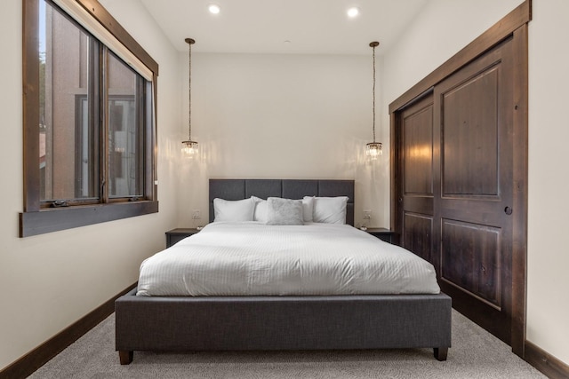 carpeted bedroom with recessed lighting and baseboards