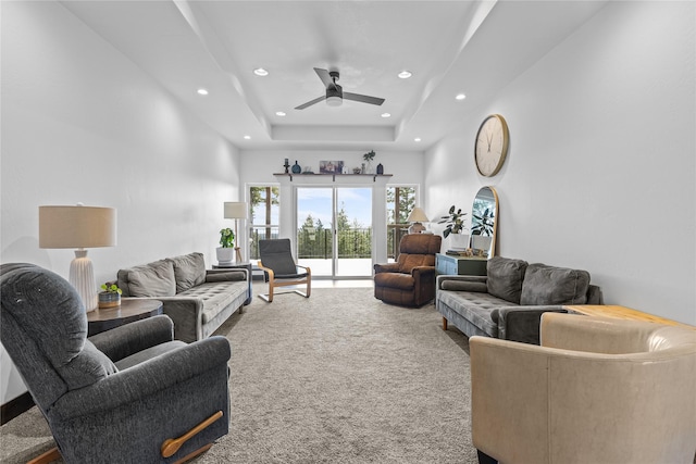 270 Westridge Dr, Somers, MT 59932 - carpeted living room with a high ceiling, recessed lighting, a ceiling fan, and a tray ceiling