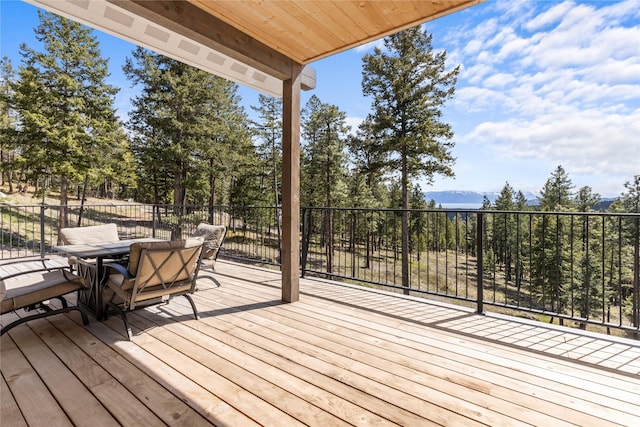 270 Westridge Dr, Somers, MT 59932 - wooden terrace with a mountain view and outdoor dining area