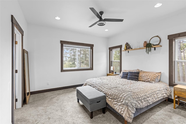 270 Westridge Dr, Somers, MT 59932 - carpeted bedroom with baseboards, recessed lighting, a ceiling fan, and multiple windows