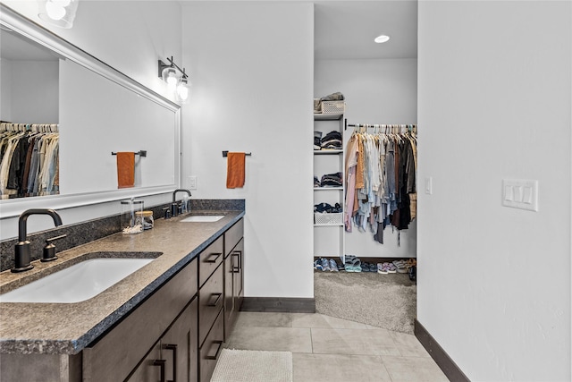 270 Westridge Dr, Somers, MT 59932 - full bath featuring double vanity, baseboards, and a sink