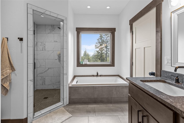 270 Westridge Dr, Somers, MT 59932 - bathroom with a tile shower, tile patterned flooring, a bath, and vanity