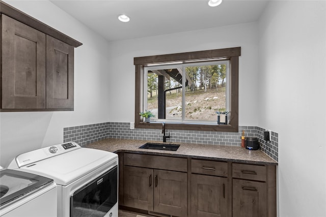 270 Westridge Dr, Somers, MT 59932 - clothes washing area with recessed lighting, independent washer and dryer, a sink, and cabinet space