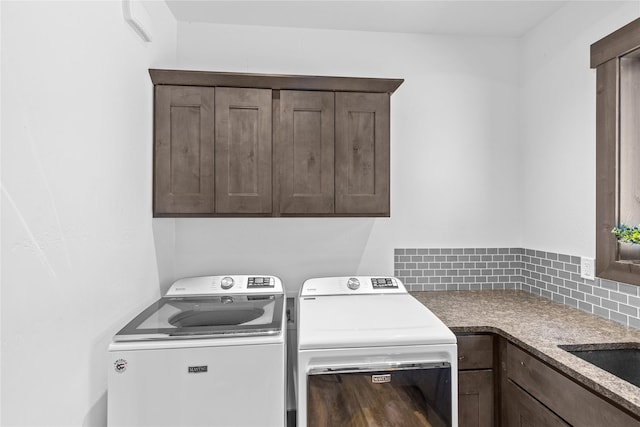 270 Westridge Dr, Somers, MT 59932 - laundry room featuring a sink, washer and dryer, and cabinet space