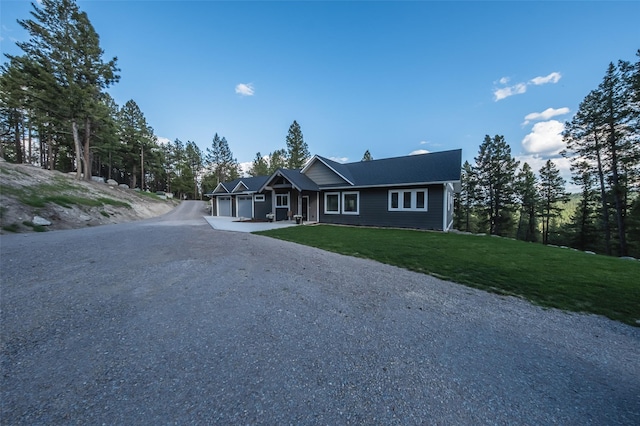 270 Westridge Dr, Somers, MT 59932 - ranch-style home featuring driveway, a front yard, and a garage