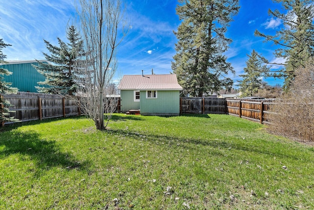 view of yard with a fenced backyard
