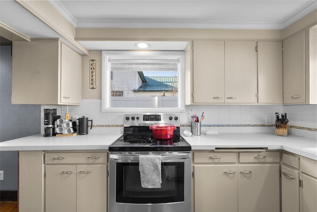 kitchen featuring tasteful backsplash, stainless steel electric stove, ornamental molding, and light countertops