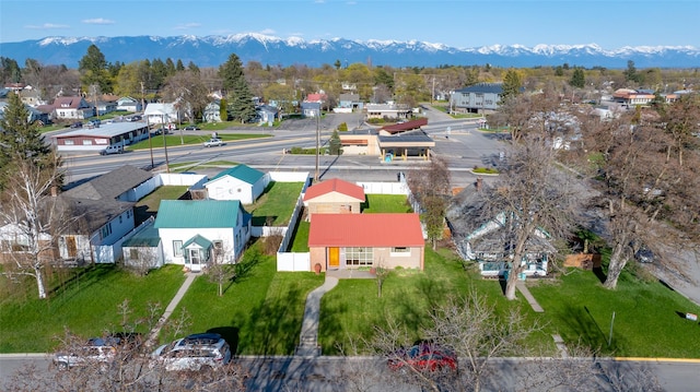 aerial view featuring a mountain view and a residential view