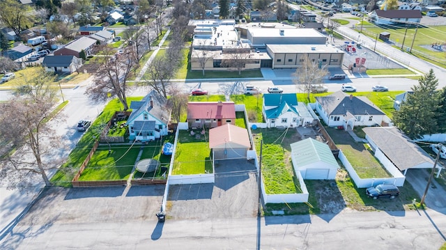 birds eye view of property with a residential view