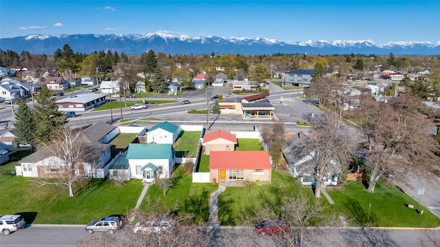 drone / aerial view with a mountain view and a residential view