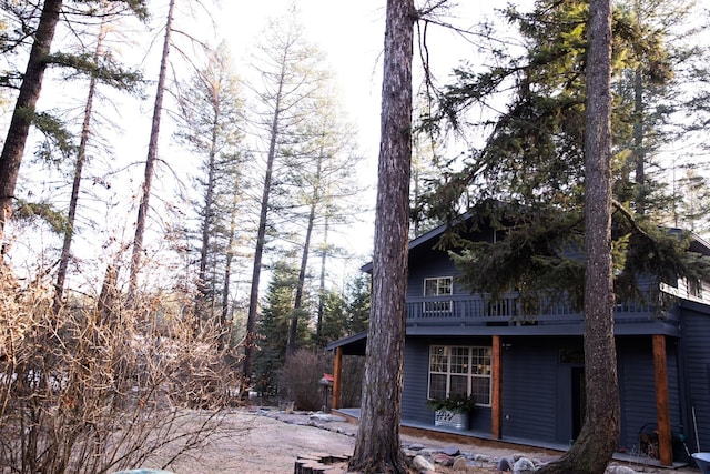 view of side of property with a porch