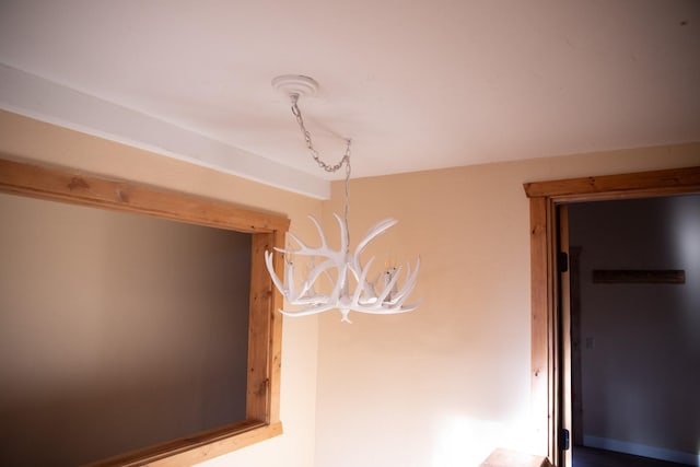 interior details with a chandelier