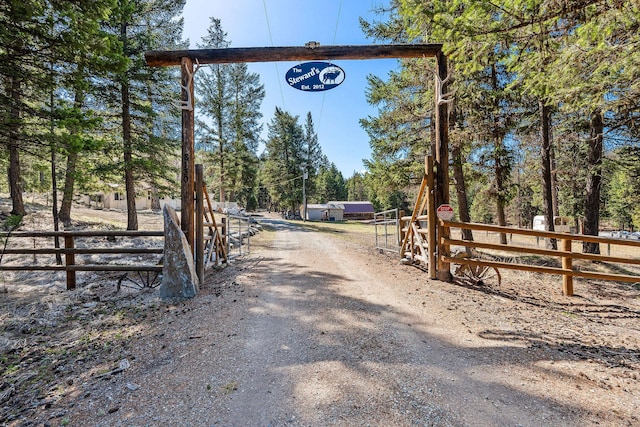view of community featuring fence
