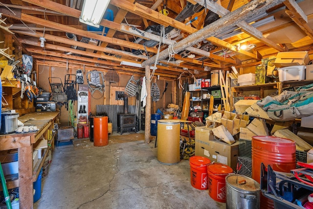 below grade area featuring a wood stove