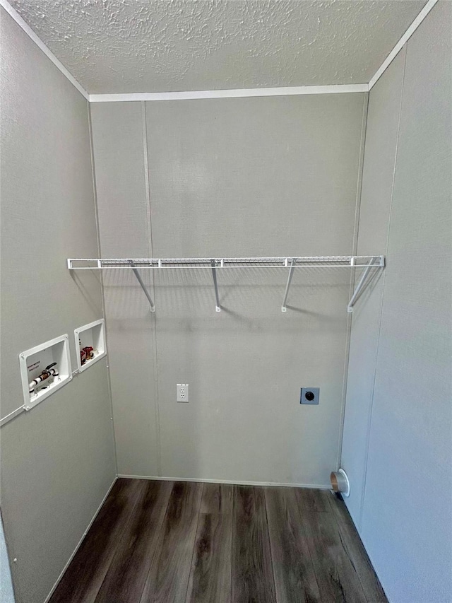 washroom with hookup for a washing machine, hookup for an electric dryer, wood finished floors, and crown molding