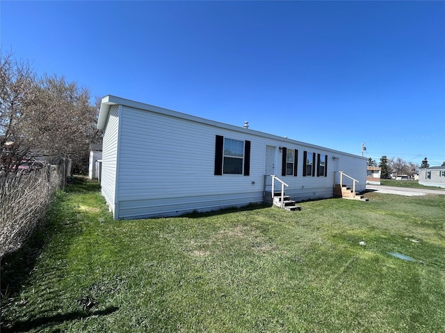 1340 Willow Glen Dr Unit 23, Kalispell, MT 59901 - back of house featuring entry steps