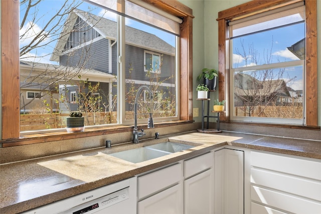 3383 Sora Way, Bozeman, MT 59718 - kitchen featuring dishwasher and white cabinetry