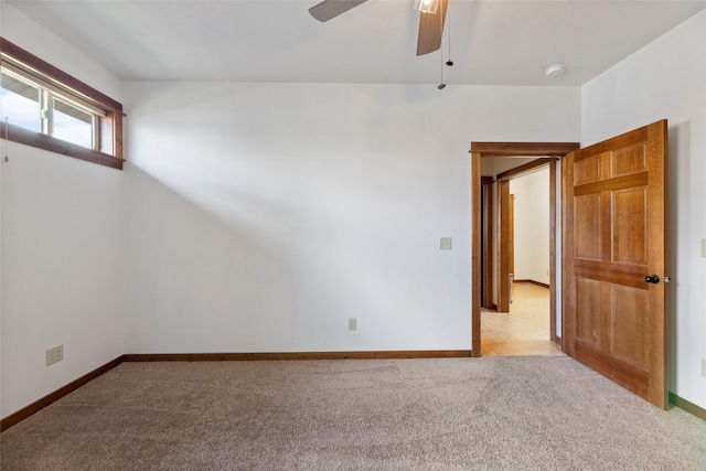 3383 Sora Way, Bozeman, MT 59718 - spare room featuring light colored carpet, a ceiling fan, and a smoke detector