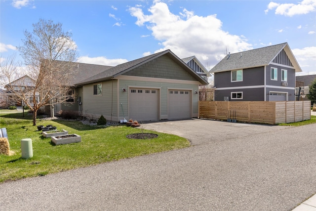 3383 Sora Way, Bozeman, MT 59718 - view of front of home with driveway and an attached garage