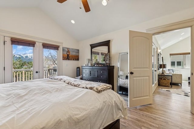 bedroom with a ceiling fan, access to outside, multiple windows, and light wood finished floors