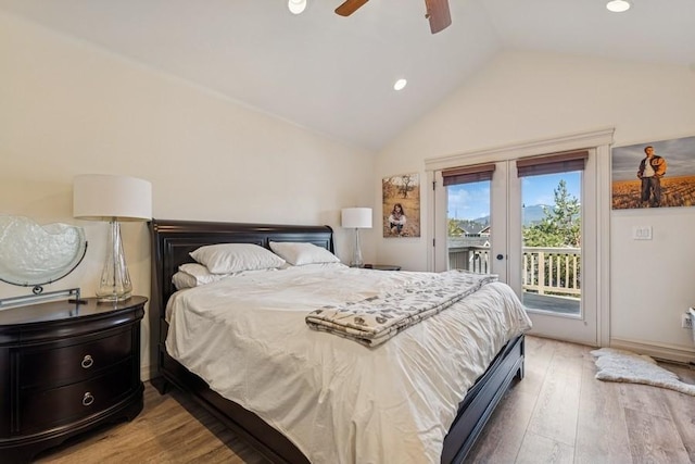 bedroom with wood finished floors, recessed lighting, vaulted ceiling, and access to outside