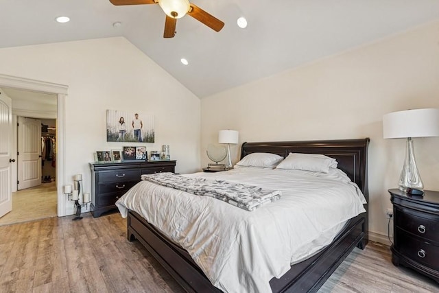 bedroom with light wood-type flooring, recessed lighting, a ceiling fan, and vaulted ceiling