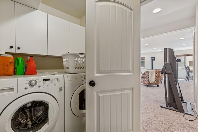 clothes washing area featuring recessed lighting, cabinet space, separate washer and dryer, and carpet flooring
