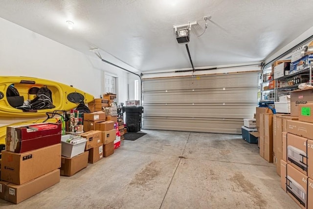 garage featuring a garage door opener