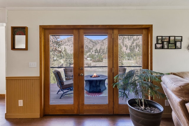 390 Dairy Ln, Superior, MT 59872 - doorway to outside with a mountain view, plenty of natural light, ornamental molding, and french doors