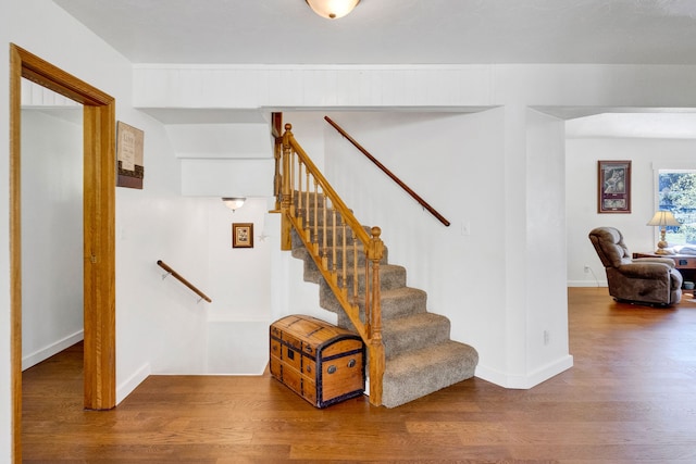 390 Dairy Ln, Superior, MT 59872 - stairs with wood finished floors and baseboards