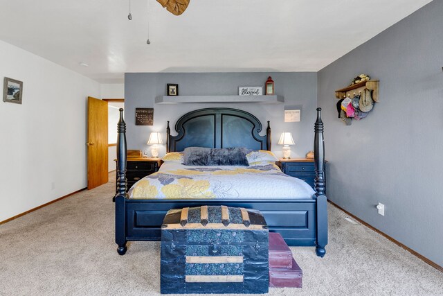 390 Dairy Ln, Superior, MT 59872 - bedroom featuring carpet flooring, baseboards, and ceiling fan
