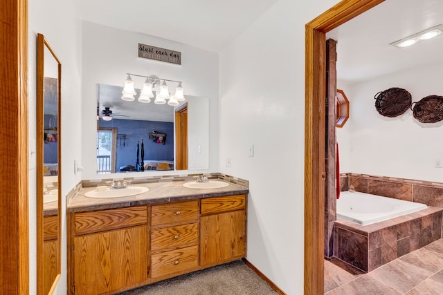 390 Dairy Ln, Superior, MT 59872 - ensuite bathroom with double vanity, tiled tub, and a ceiling fan