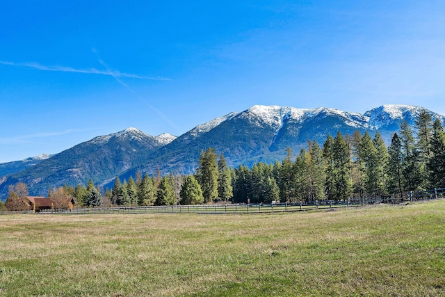 mountain view featuring a rural view