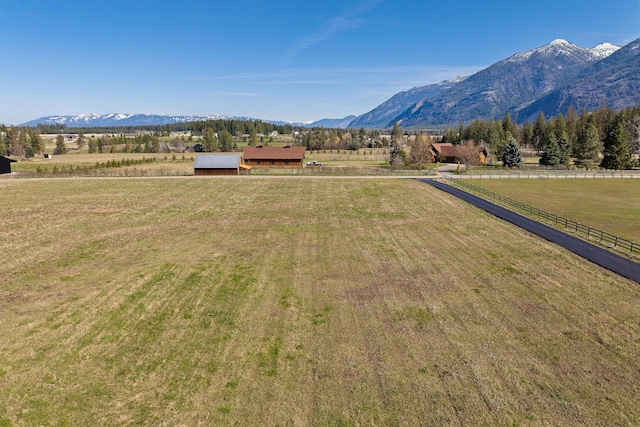 view of mountain feature featuring a rural view