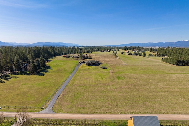 aerial view featuring a mountain view and a rural view
