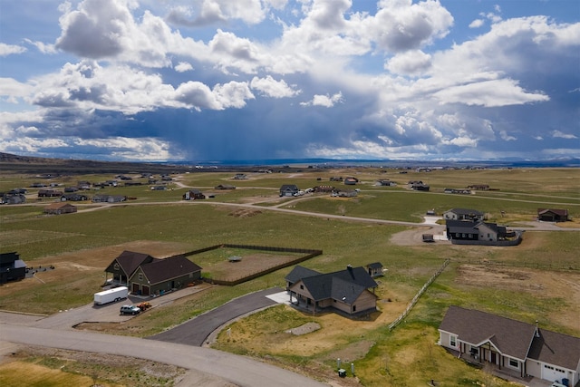 birds eye view of property featuring a rural view