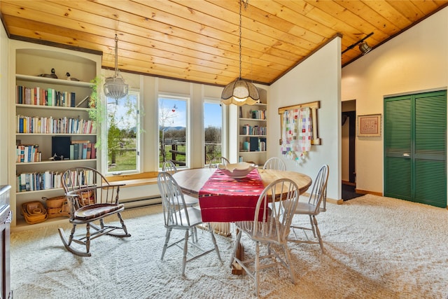 carpeted dining area featuring baseboards, vaulted ceiling, and wooden ceiling