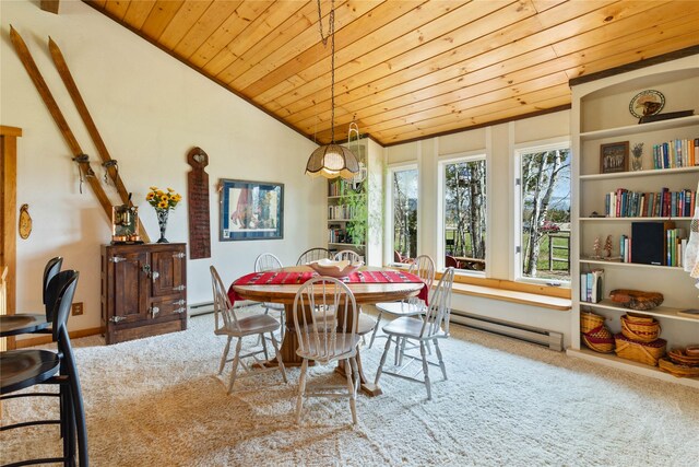 7850 Stegner Dr, Missoula, MT 59808 - carpeted dining area with vaulted ceiling, a baseboard heating unit, and wooden ceiling
