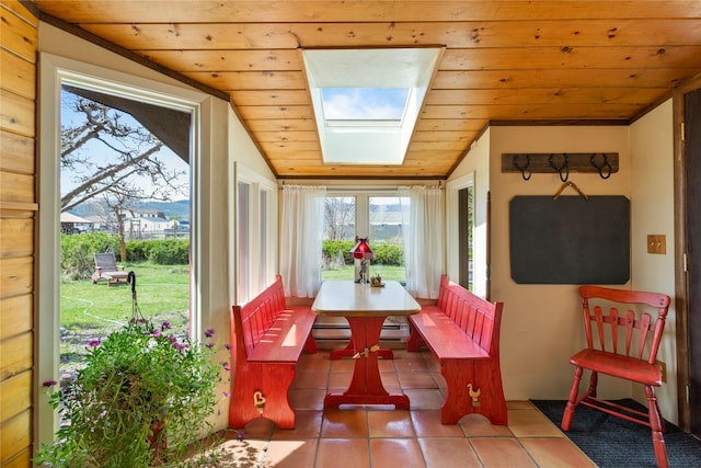 sunroom featuring a skylight