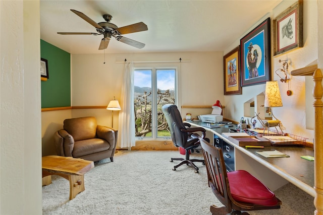 office space featuring carpet and a ceiling fan