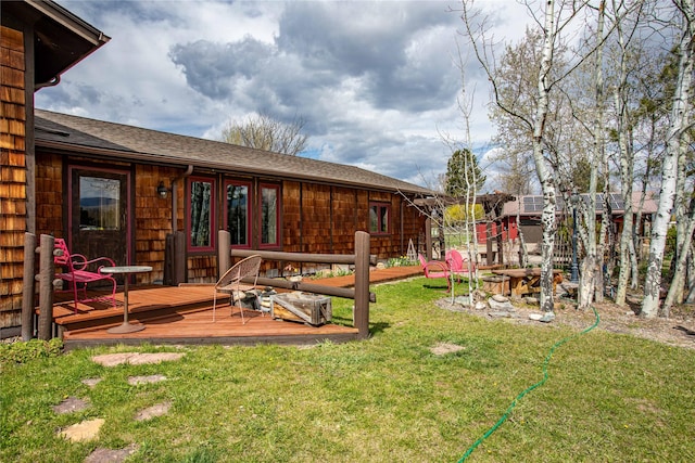 view of yard featuring a deck