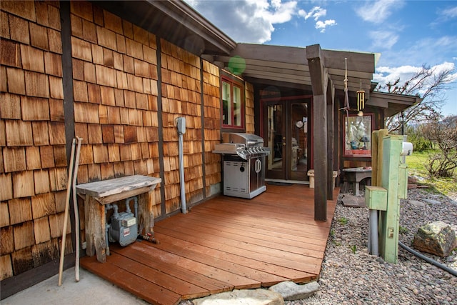 wooden deck with area for grilling