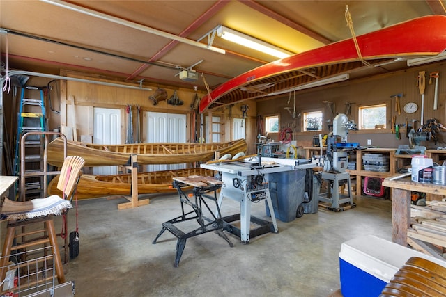7850 Stegner Dr, Missoula, MT 59808 - garage with a workshop area and a garage door opener