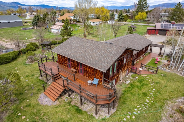 drone / aerial view featuring a mountain view