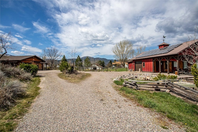 7850 Stegner Dr, Missoula, MT 59808 - view of dirt / gravel driveway with a mountain view
