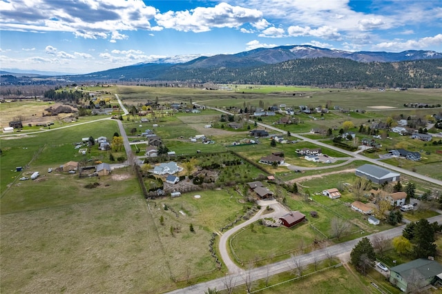 bird's eye view with a mountain view and a rural view
