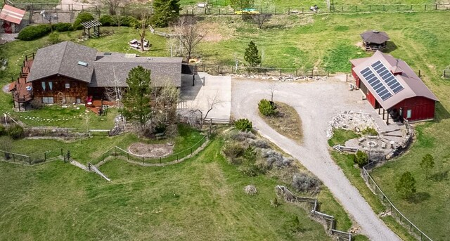 7850 Stegner Dr, Missoula, MT 59808 - aerial view of property's location with a mountain backdrop and rural landscape