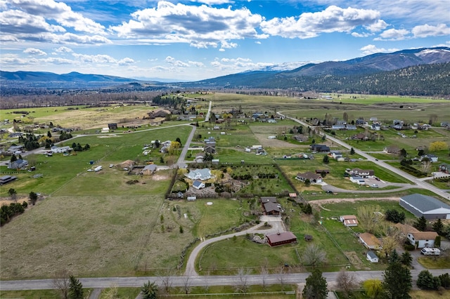 bird's eye view with a mountain view and a rural view