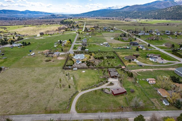 7850 Stegner Dr, Missoula, MT 59808 - aerial view of sparsely populated area featuring a mountainous background