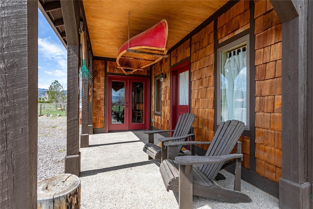 7850 Stegner Dr, Missoula, MT 59808 - view of patio / terrace with french doors and a mountain view
